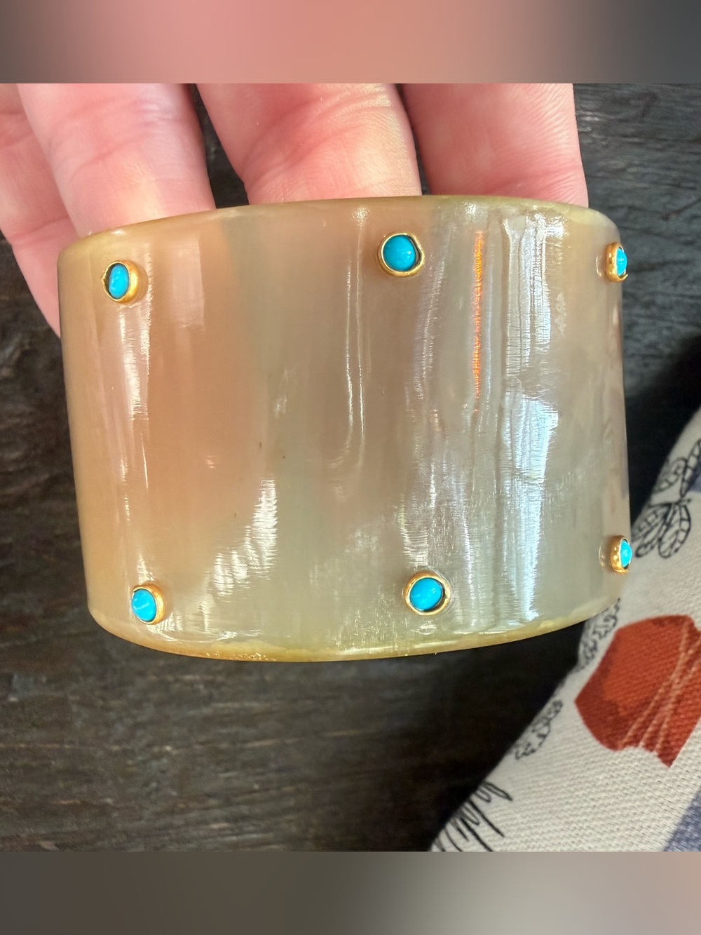 Buffalo horn bangle with six authentic turquoise inlays.